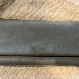 Able baby blue wallet made of a soft leather.